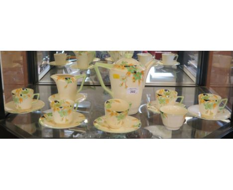 A Crown Ducal coffee service, Linden pattern with five coffee cans and saucers