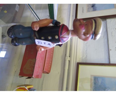 A Japanese Kuramuchi celluloid clockwork Popeye toy, 22cm, lacks pipe and two empty Tex boxes
