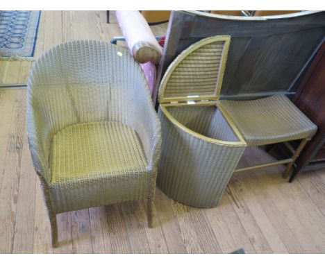 A Lloyd Loom armchair, corner basket and stool (3) Basket and stool with 'Lusty' labels 