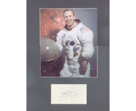 Apollo 13 James Lovell. Signature mounted with portrait in space suit. Professionally mounted to 14 x 11 inch. Good condition