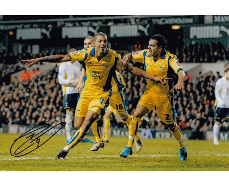 Football Autographed Jermaine Beckford 12 X 8 Photo Col, Depicting The Leeds United Striker Running Away In Celebration After