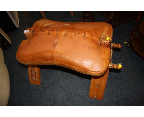 A VINTAGE LEATHER AND WOOD CAMEL STOOL W - 75CM