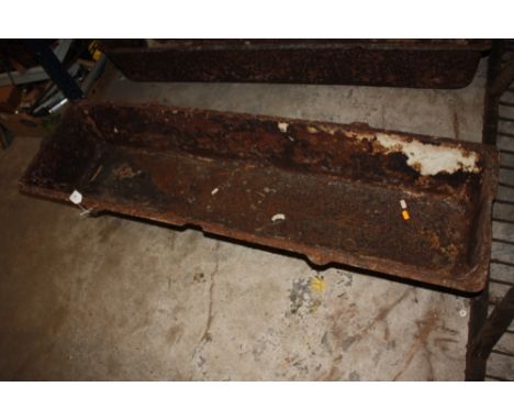 A LARGE METAL TROUGH