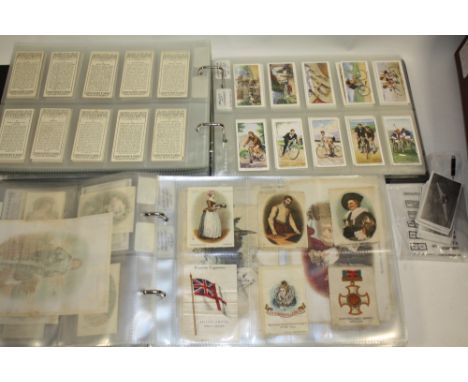 TWO ALBUMS OF VINTAGE CIGARETTE CARDS TO INCLUDE PLAYERS, CHAIRMAN, LAMBERT AND BUTLER ETC