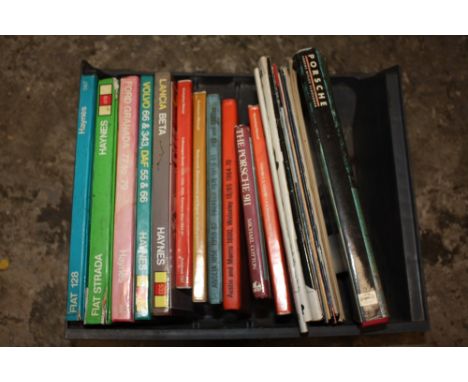A COLLECTION OF AUTOMOBILE BOOKS TO INCLUDE HAYNES MANUALS