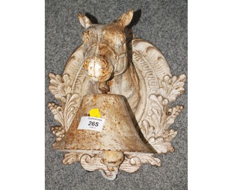 A VINTAGE CAST METAL HORSE SHAPED WALL HANGING BELL 