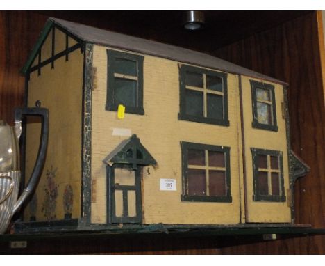 A VINTAGE SCRATCH BUILT WOODEN DOLLS HOUSE 