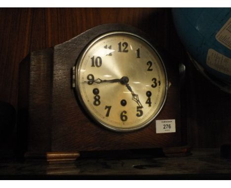 A VINTAGE OAK MANTEL CLOCK 