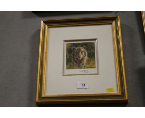 A GILT FRAMED AND GLAZED SIGNED LIMITED EDITION PRINT BY DAVID SHEPHERD OF A TIGER CUB