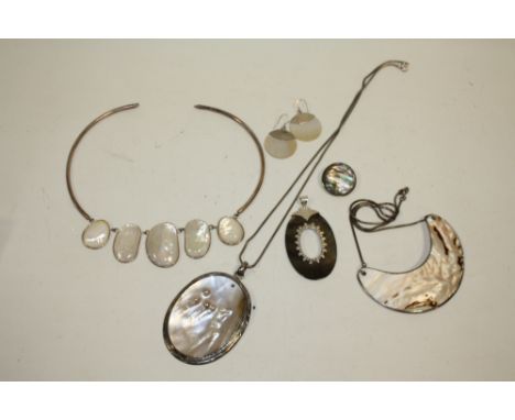 A BAG OF SILVER AND MOTHER OF PEARL JEWELLERY 
