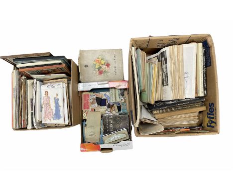 Vintage clothing patterns, various buttons, hooks and other haberdashery, craft magazines, embroidery books etc in three boxe