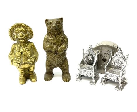 A group of vintage money boxes, to include a brass model of a standing Bear, H15.5cm, brass Clown, Midland Bank Limited money