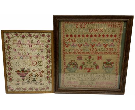 Early Victorian sampler, worked by Sarah Makin Hodfon [?] Aged 10, dated 1831, depicting urns of flowers beneath lines of alp