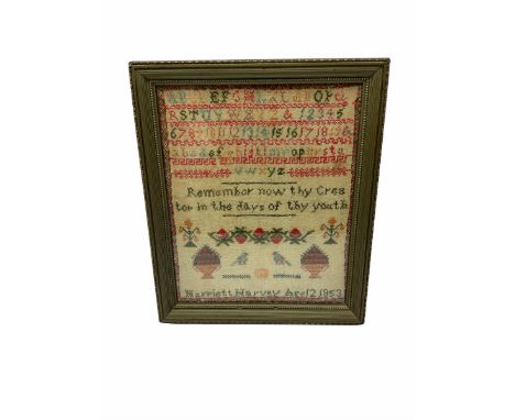 Early Victorian sampler, worked by Harriett Harvey, Aged 12, dated 1853, depicting urns of flowers, birds, crown and strawber