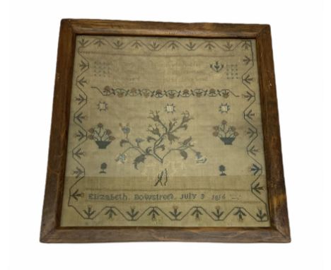 George III sampler, worked by Elizabeth Bowstree, dated July 1816, finely worked with floral spray flanked by flowering urns,