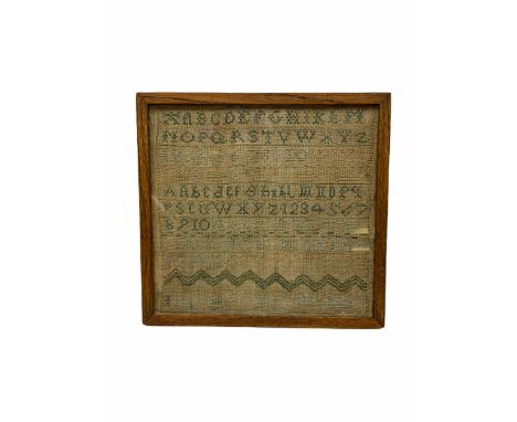 George II alphabet sampler, worked by Elizabeth Oatton[?], dated 1745, worked with alphabet and crown and heart motifs, frame
