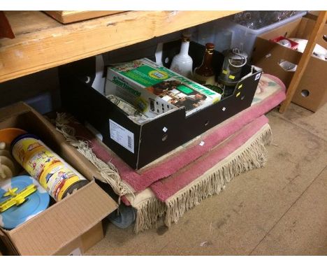 Shelf of assorted including a Miner's lamp, rugs etc.