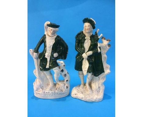 A pair of Staffordshire figures of Highlanders