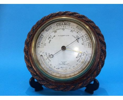 An oak rope twist barometer by Blakey and Co.