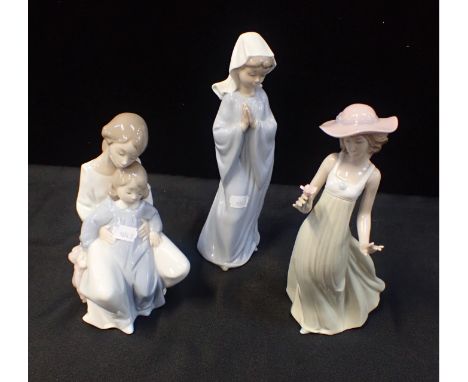 THREE NAO FIGURINES