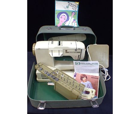 A 1960s BERNINA CLASS 730 'RECORD' SEWING MACHINEcased with manual etc (untested)