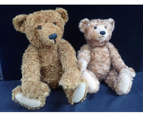 A LARGE MODERN STEIFF BEAR approx 70cm high, and another approx 62cm (both lacking labels or buttons, some signs of moth)