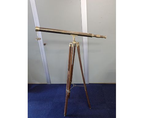 A BRASS TELESCOPE AND TRIPOD(a/f)