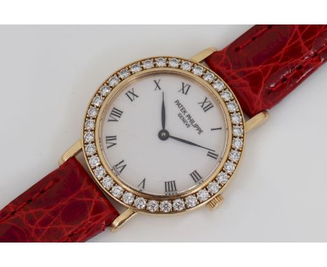   PATEK PHILIPPE Damenarmbanduhr ¨Lady CALATRAVA¨750er Gelbgold, rundes Gehäuse, D 26mm, Lüne  PATEK PHILIPPE Damenarmbanduhr