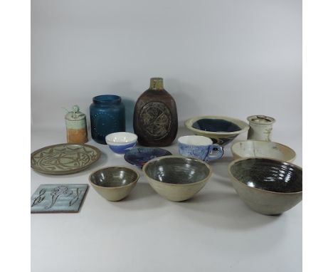 A collection of studio pottery vases and bowls, to include a set of three Leach pottery bowls, largest 23cm diameter, a large