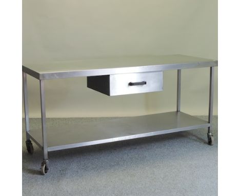 A stainless steel work table, with a single drawer and pot shelf below, 180cm