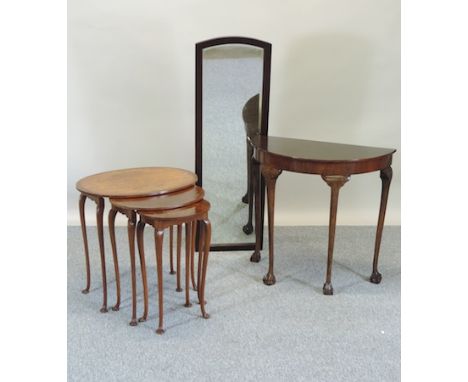 A burr walnut nest of three occasional tables, together with a dressing mirror and a half round occasional table (3)