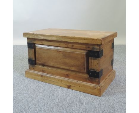 A small pine and metal bound trunk, 59cm