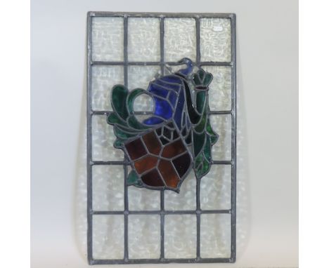 A 20th century stained glass panel, 73 x 43cm