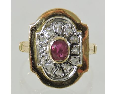 An 18 carat gold ruby and diamond ring, boxed 