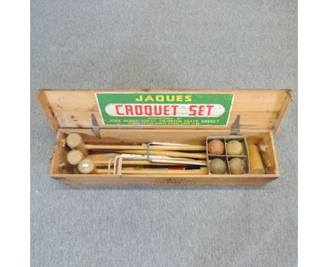 A vintage Jaques croquet set, in a wooden box, 111cm