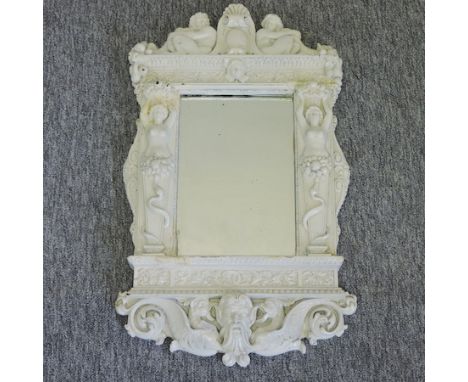 A 19th century white painted ornate wall mirror, surmounted by classical maidens, 60 x 36cm overall