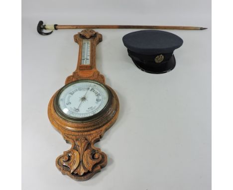 A walking stick, with an antler handle, together with an RAF officer's cap and an oak barometer, 73cm tall