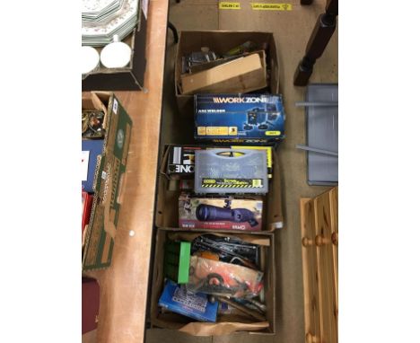 Three boxes of tools and a welder