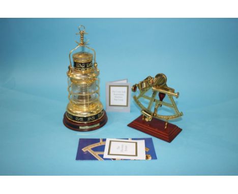 Reproduction model sextant and a ships lamp