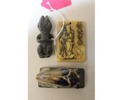 Three Chinese archaic and archaised jade carvings comprising; a Taotie figure, 6cm high, a stylised figure of a cicada, 6.5cm