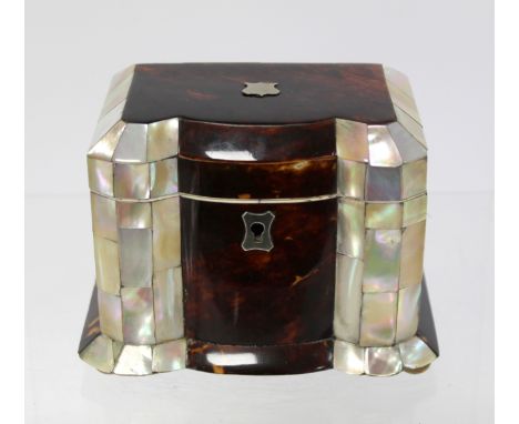 Georgian tortoiseshell and mother of pearl of pearl tea caddy of rectangular form with lobed front, with white metal shield s