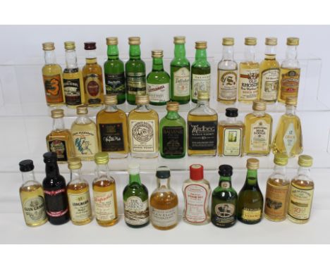 Collection of thirty three Scotch Whisky miniatures, mainly single malts, each 5cl.&nbsp; (33). 
