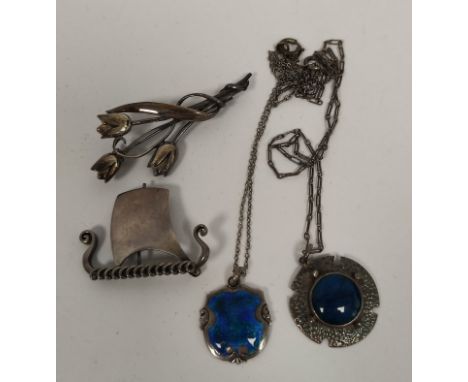 Silver and blue enamel pendant, J Fenton, Birmingham 1911, a similar pendant, a Danish silver longboat brooch and two others.