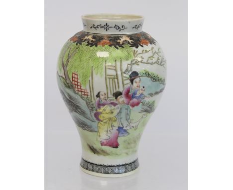 Chinese porcelain vase of baluster form, probably early 20th century, with painted polychrome enamel decoration depicting a f