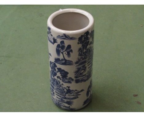 A blue and white ceramic umbrella/stick stand. Modern