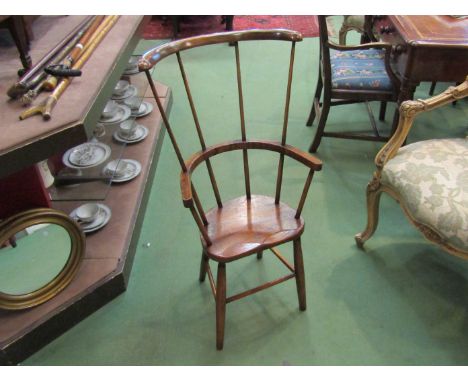 An 18th Century revival elm and ash high stick back child's elbow chair with saddle seat 