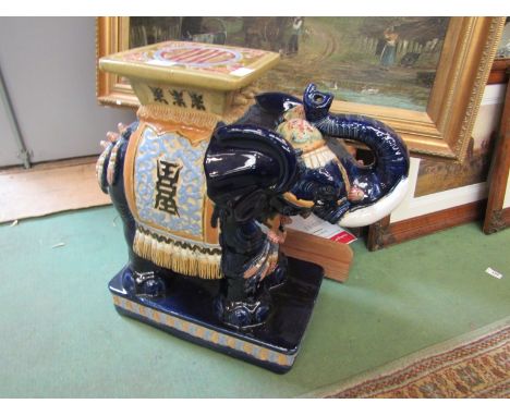 A late 20th Century ceramic elephant jardinere stand