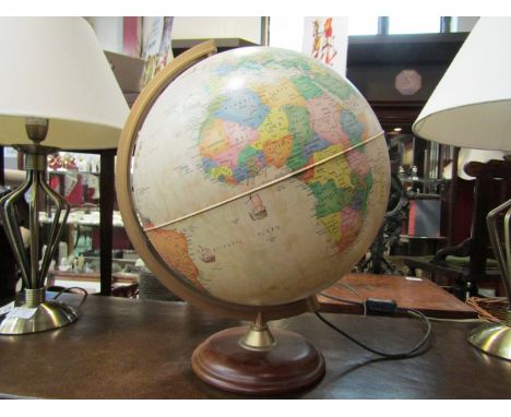 A vintage style illuminating world globe with electric bulb.  (DTI Failure: please see information pages)