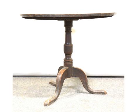 George III oak tripod table, circular tilt top, turned column, three splayed legs, diameter 80cm, height 71cm.