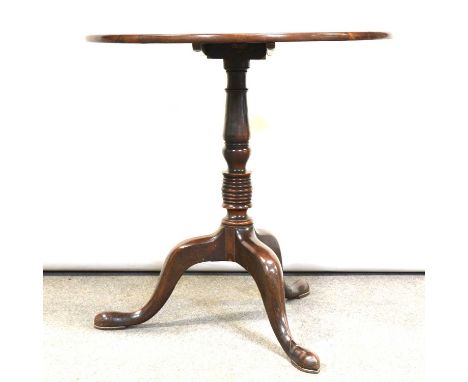 Georgian mahogany tripod table,circular tilt top, turned and ringed column, three splayed legs, diameter 74cm, height 73cm.Co